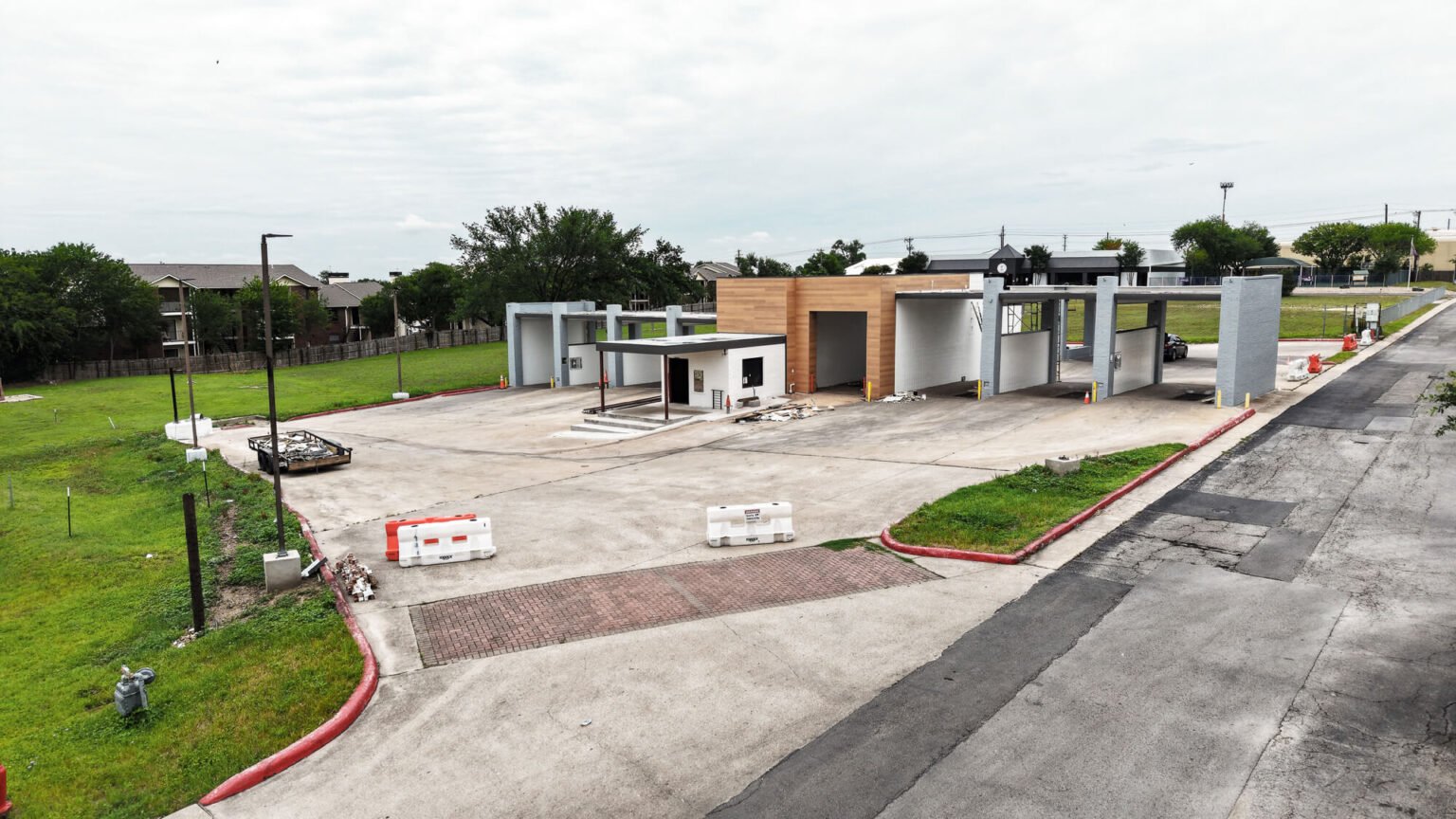Aerial view of Freddie’s Carwash after exterior renovations and site improvements in Wells Branch.